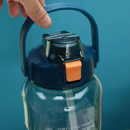 1.5L Sports Water Bottle With Straw For Daily Hydration clear Tritan bottle with handle, flip cap and orange latch, straw visible, 1.5L size