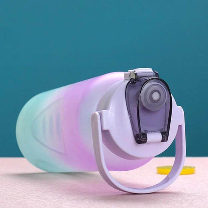 1.5L Sports Water Bottle With Straw For Daily Hydration showing pastel Tritan bottle with flip straw cap and carry handle