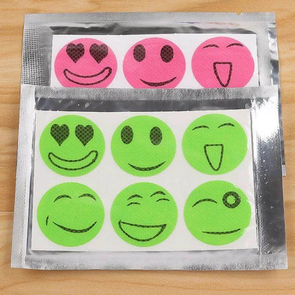 10-Pack Mosquito Repellent Stickers For Outdoor Wear showing pink and green smiley-face citronella stickers in sealed packets for attaching to clothing
