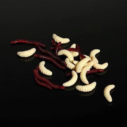 101 Piece Fishing Lure Kit With Plastic Box For Everyday Fishing - closeup of soft grub and worm style lures on black background