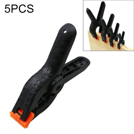 117mm Backdrop Spring Clamp for Photo Studio and Woodworking - black spring clamp with orange tips holding wood, rounded handle, pack of 5