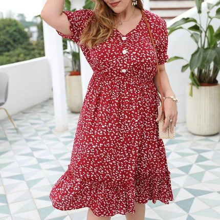 Women's Plus Size Floral Cotton Sun Dress in Rouge Color – model wearing rouge floral cotton sun dress with buttons and ruffled hem