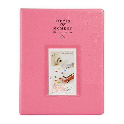 128-Pocket Instax Mini Photo Album For Fujifilm Instax Mini Cameras - pink PVC cover with front photo window and "Pieces of Moment" text