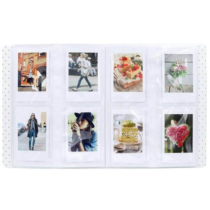 128-Pocket Instax Mini Photo Album For Fujifilm Instax Mini Cameras - open PVC album showing eight Instax mini photos, lightweight travel memory organizer
