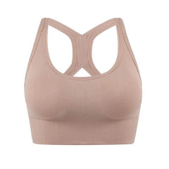 Elegant adjustable sports bra for women in beige, large size, cross-back design, shockproof, perfect for yoga and workouts.