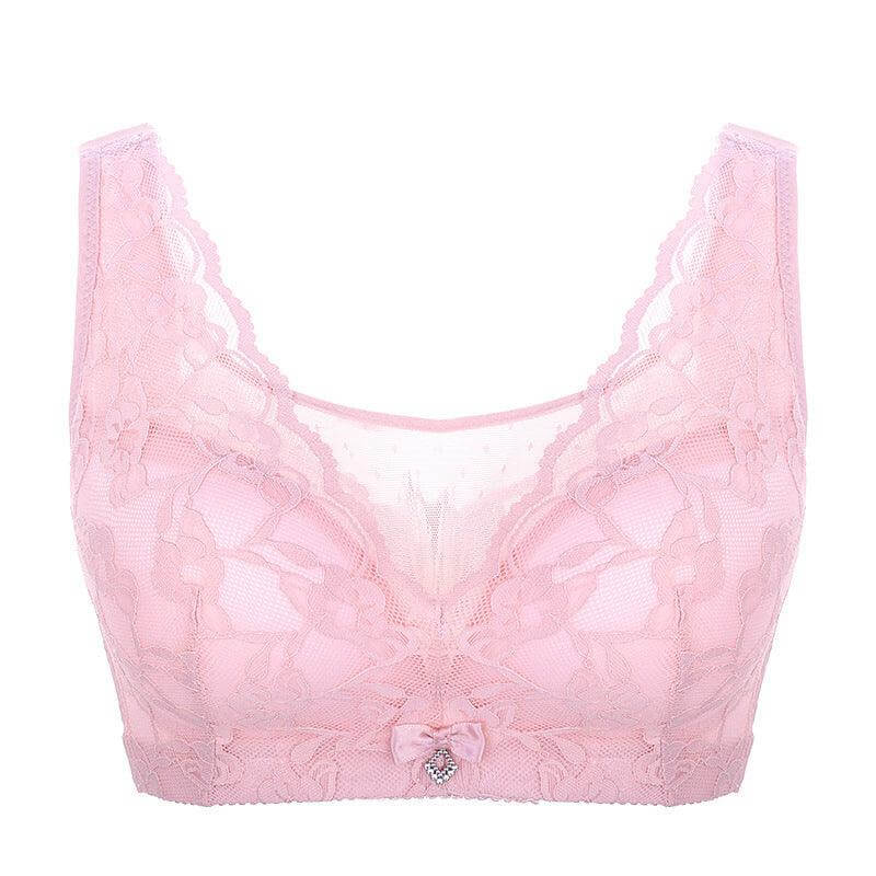 Light pink full coverage bra with lace edge and decorative bowknot, providing comfort and style.