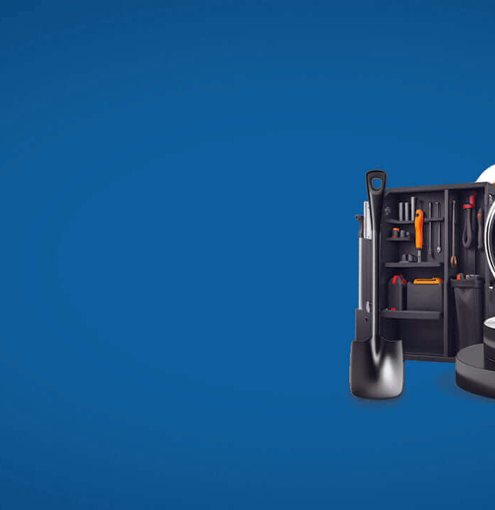 Blue banner with camera lens, tools, sneaker, basketball and black teddy bear on a display pedestal