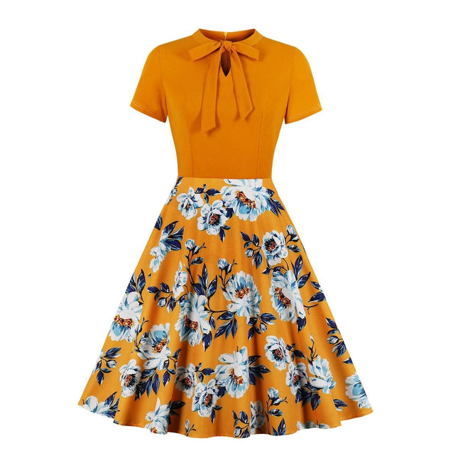 Alt Tag: Women's Floral Dress for Casual Everyday Outings mustard fit-and-flare with short sleeves and blue floral skirt, polyester-spandex comfort