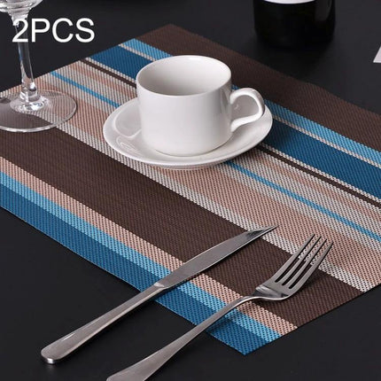 2-Pack PVC Stripe Placemats For Everyday Dining 45 X 30 Cm striped brown blue PVC placemat with cup fork and knife on black table