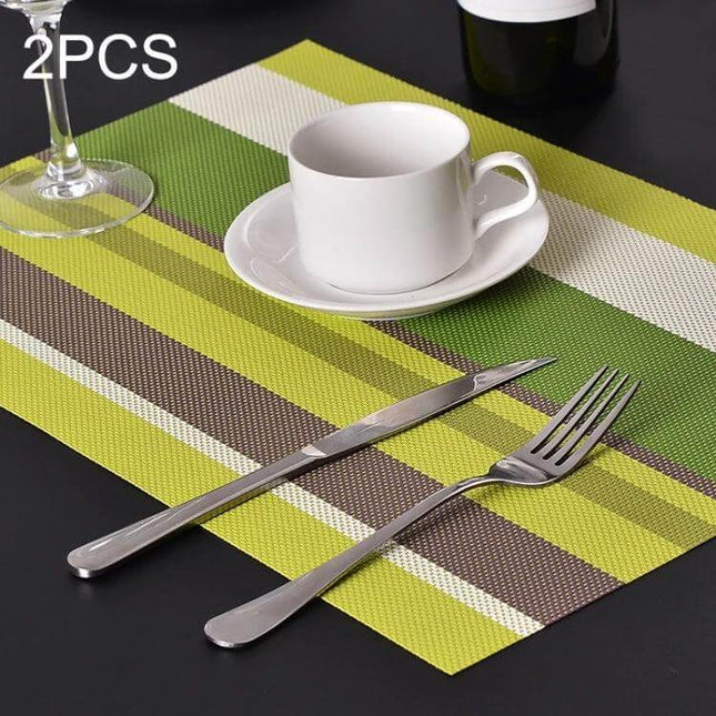 2-Pack PVC Stripe Placemats For Everyday Dining 45 X 30 Cm - green brown striped PVC placemat with cup, fork and knife on black table