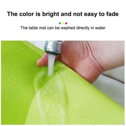 2-Pack PVC Stripe Placemats For Everyday Dining 45 X 30 Cm - bright green PVC placemat being wiped clean under faucet, water-resistant, easy to wipe