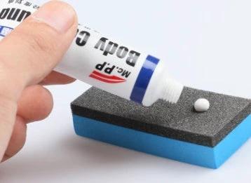 Car Scratch Remover Paste for Minor Auto Paint Repairs — tube dispensing paste onto applicator sponge for DIY spot paint repair