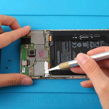 28-in-1 Phone CPU BGA Chip Removal Scraping Knife Set For Phone Repair - technician using scraping knife to remove phone CPU module on Huawei motherboard