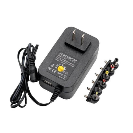 3-12V Adjustable Voltage Power Supply With EU and US Plug - compact 12W DC adapter with US plug, adjustable 3–12V output and multiple connector tips