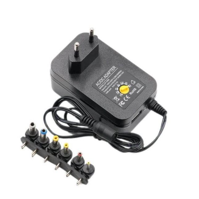 3-12V Adjustable Voltage Power Supply With EU and US Plug black 12W adjustable DC adapter with multiple connector tips for electronics