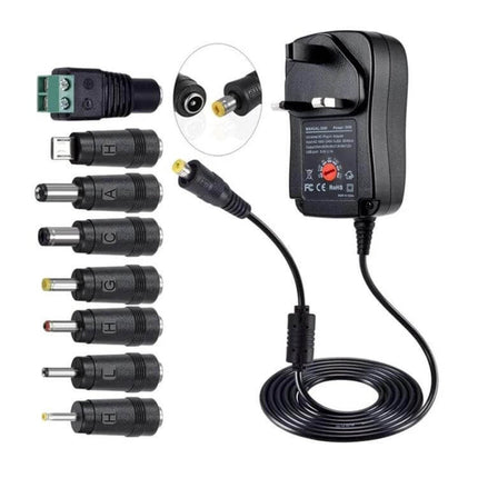 30W USB Power Adapter With Monitoring LED For Everyday Charging shown with multiple interchangeable DC tips, compact travel wall charger and front LED status indicator