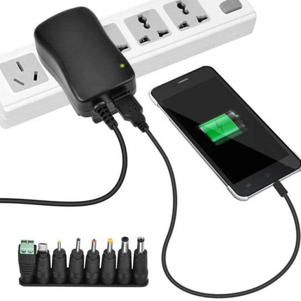 30W USB Power Adapter With Monitoring LED For Everyday Charging — compact wall charger with green LED charging smartphone and multiple tip set