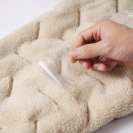 Men's Comfortable Padded Cotton Blend Trousers for Daily Use beige padded lining close-up showing soft cotton blend fabric and hand peeling protective film