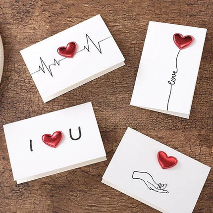 3D Heart Valentine Day Greeting Card With Envelopes featuring four white cards with red 3D heart accents and simple black line art designs