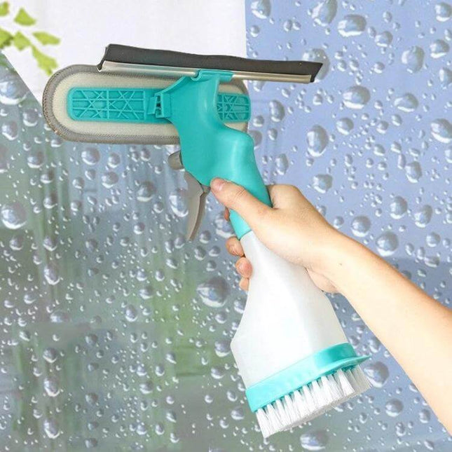 4 In 1 Double Sided Glass Wiper Window Squeegee With Spray Bottle held to clean a wet glass window, showing squeegee, brush and 250ml spray bottle