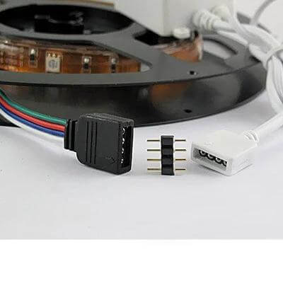 4 Pin Male RGB LED Strip Connector For Flexible Lighting showing black 4-pin male plug with RGB strip reel and white connector for quick solderless joins