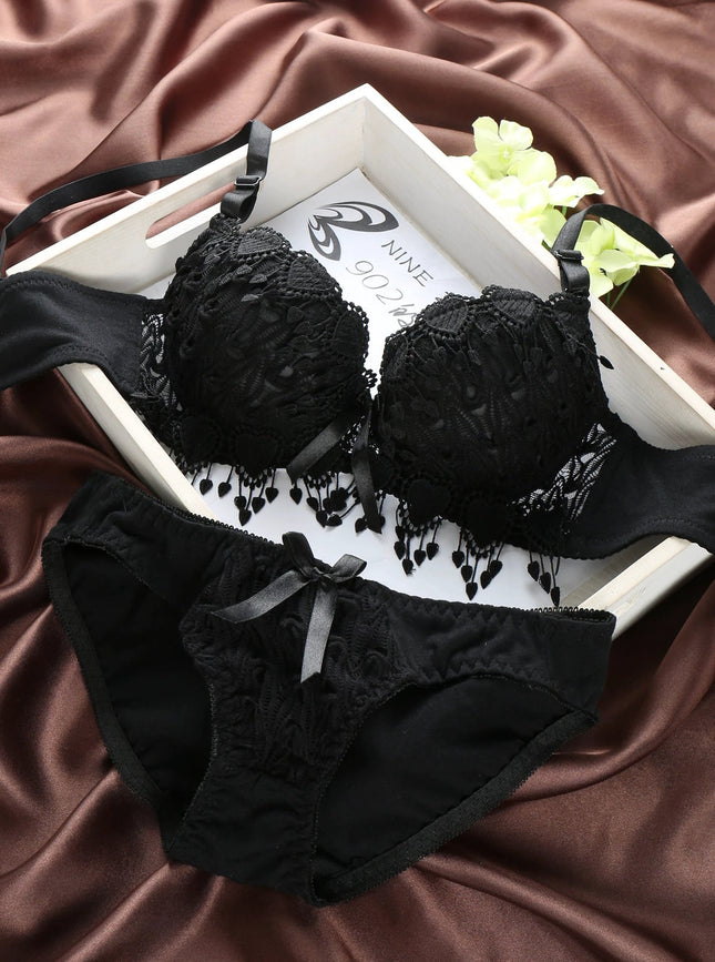 Elegant Lace Gathered Bra Set for Young Women with Style Options Black lace gathered bra and matching panties on satin tray