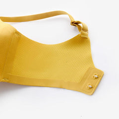 Luxurious yellow push-up bra with no steel ring, showing adjustable strap and back closure. Made from high-quality nylon for ultimate comfort.