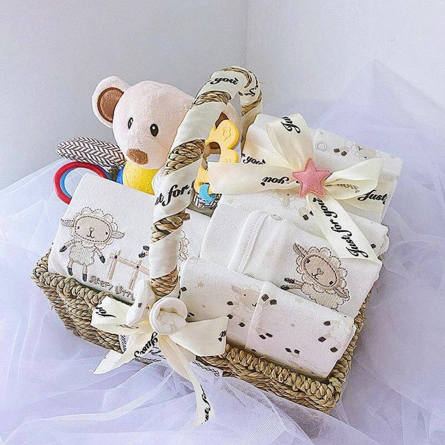 Infant Unisex Clothes Set for Autumn and Winter Gift Box featuring soft cotton essentials, plush toy and accessories in woven gift basket