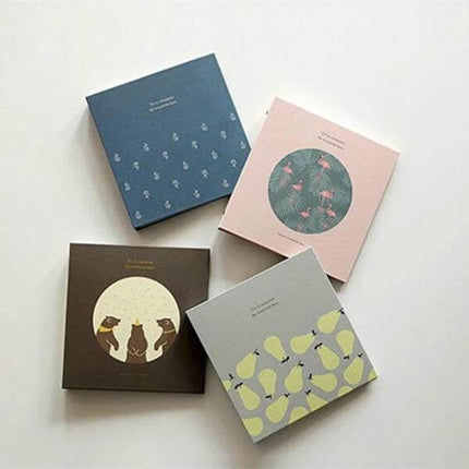 Photo Album 5 Inch Family Keepsake For Storing Memories - four decorative 5-inch compact photo albums with animal and fruit cover designs