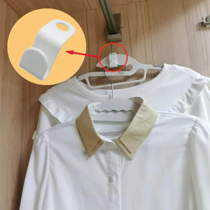 50-Pack Hanger Connecting Hooks For Closet Organization hung in a closet linking stacked hangers holding shirts