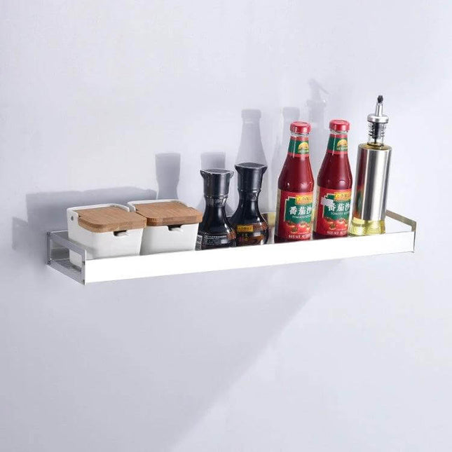 50cm Wall Mount Kitchen Seasoning Rack for Spices and Bottles mounted on wall holding bottles, jars and oil dispenser in a small kitchen
