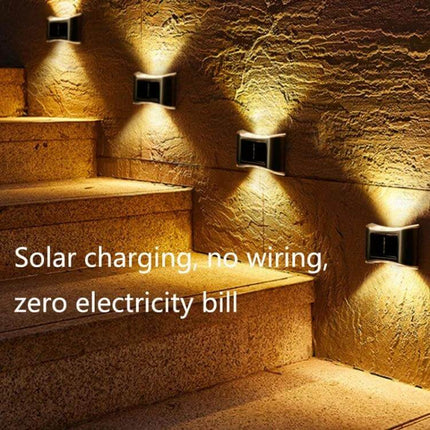 6 LED Solar Outdoor Garden Wall Lamp, Stainless Steel mounted on exterior wall illuminating stone steps, solar charging, no wiring, IP65 waterproof