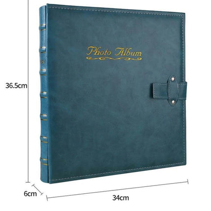 6-Inch PU Leather Photo Album With Bronzing Cover in teal with bamboo hot-stamped finish, holds up to 500 4R prints, secure snap closure