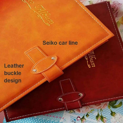 6-Inch PU Leather Photo Album With Bronzing Cover with bamboo-stamped finish, leather buckle and stitched edges holding up to 500 4R photos