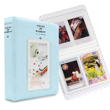 64-Pocket Instax Mini Photo Album For Your Memories showing pastel blue album with front display pocket and open pages holding Instax Mini prints