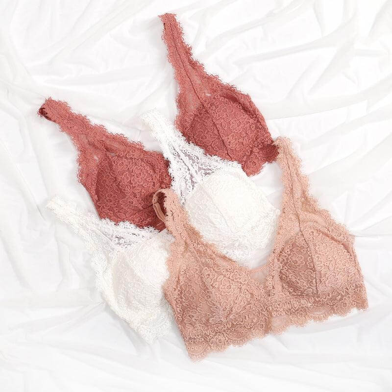 Seamless lace bra set with no rims in various colors including pink, white, and rust, displayed on a white background for unmatched comfort.