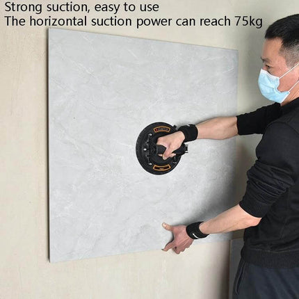 8 Inch Gas Pump Vacuum Suction Cup For Lifting Glass And Tile being used to lift a large ceramic tile with strong suction