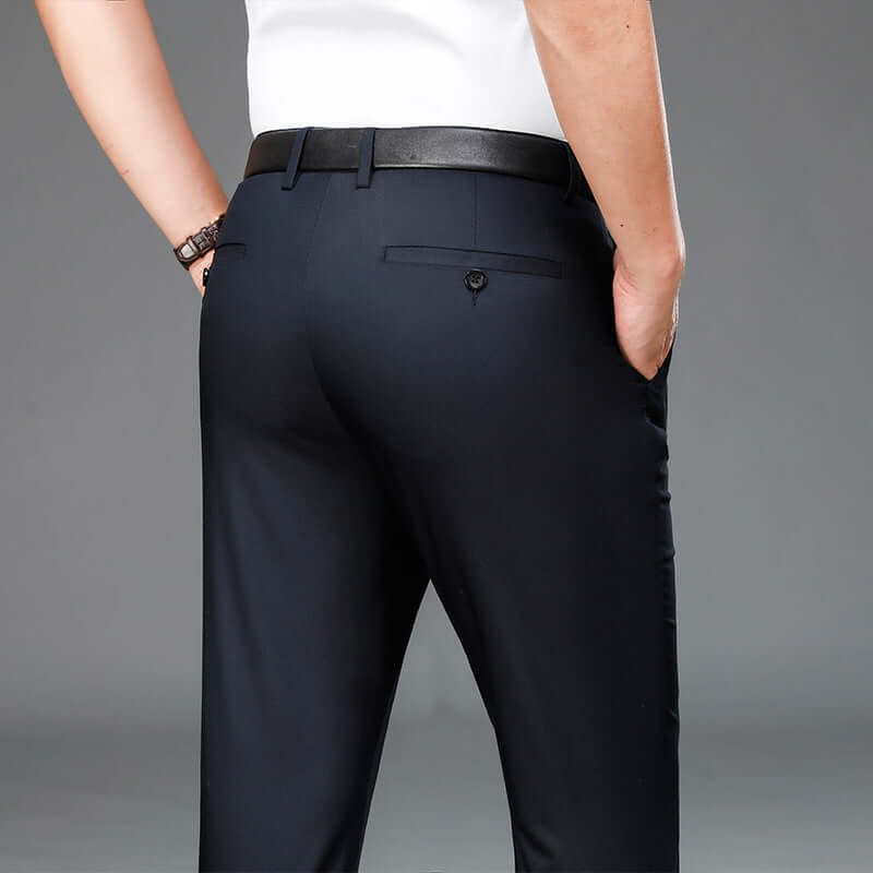 Rear view of person wearing Bamboo Fiber Lightweight Casual Business Trousers in black, showcasing premium fabric and stylish design.