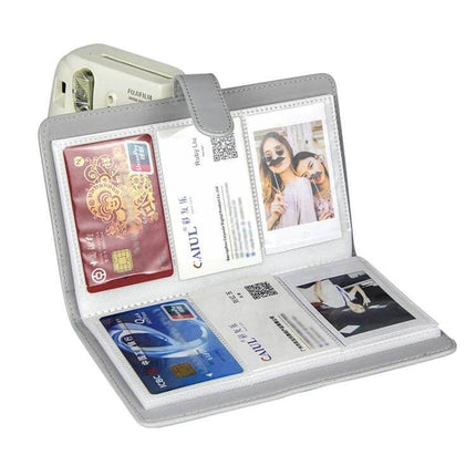 96 Photo PU Leather Album For Polaroid 3 Inch Prints - gray PU leather album open showing 3-inch Polaroid prints and card pockets