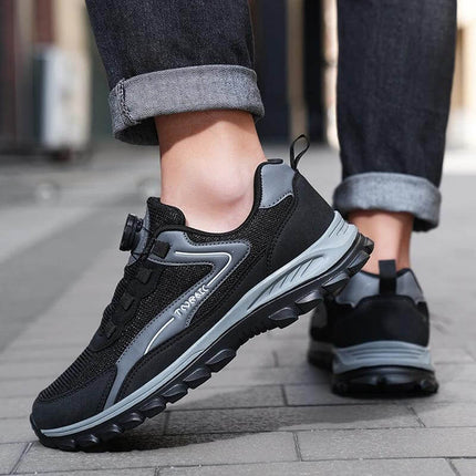 Unisex Low Top Sneakers With Thick Rubber Sole For Running black grey low-top sneaker on city pavement showing cushioned sole and slip-resistant tread