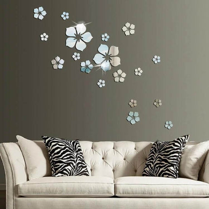 Acrylic Cherry Blossom Wall Mirror Sticker 18-Piece Set displayed above a beige sofa creating reflective floral wall accents