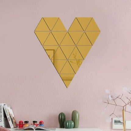 Acrylic Wall Mirror Sticker Set 16-Piece For Living Room Or Bedroom forming a geometric heart mirror art above a sofa or desk