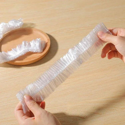 Air Conditioner Dust Cover for Indoor Unit 70x145cm - clear PE elastic cinch strip shown stretched to protect indoor AC front panel
