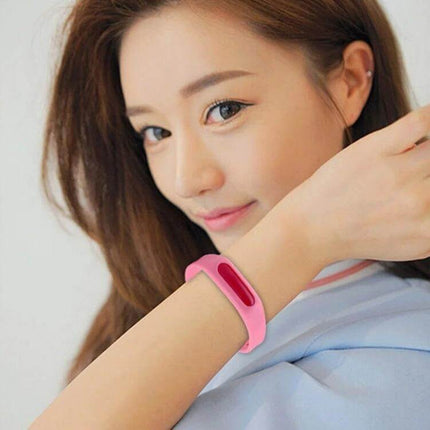 Anti-Mosquito Silicone Repellent Bracelet, 23 cm, Everyday Use - pink silicone wristband shown on woman outdoors, lightweight non-toxic protection