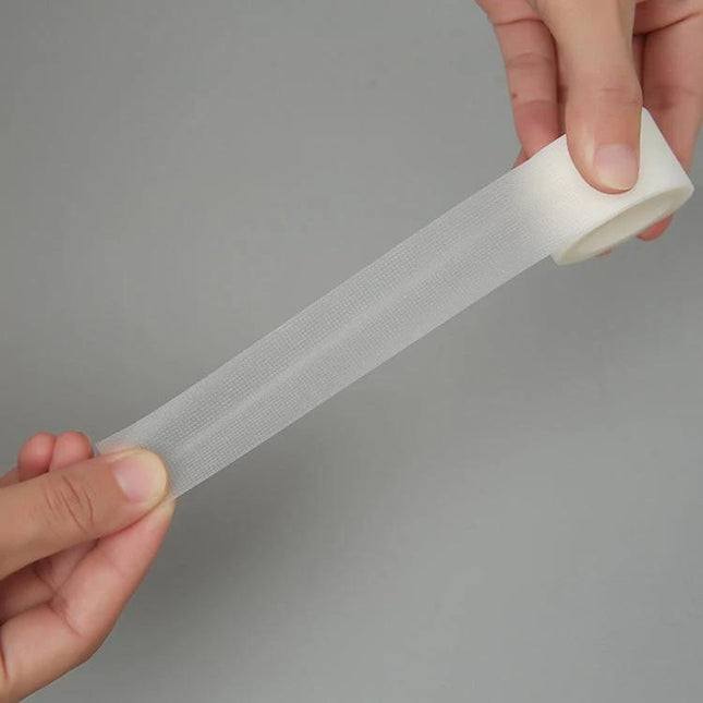 Anti-Wear Heel Stickers 5m Roll For Cracked Heel Care - breathable tearable adhesive roll being unrolled for heel protection
