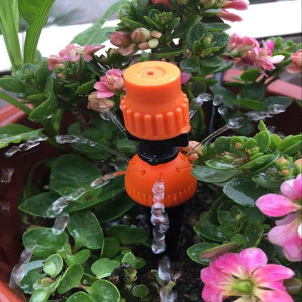 Automatic Garden Watering Device For MicroSpray Irrigation orange plastic 21 cm hose splitter installed in potted flowering plants