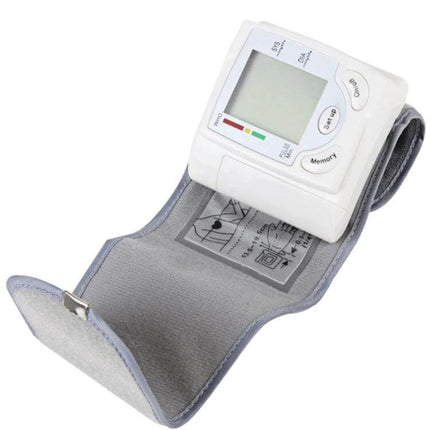 Automatic Wrist Blood Pressure Monitor For Home Use - white digital wrist blood pressure monitor with cuff and clear LCD display for daily tracking