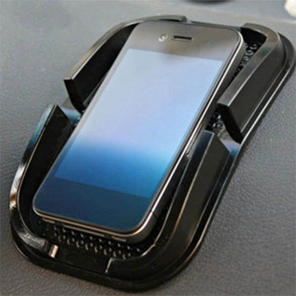 Punctate Black Car Phone Slip Mat for Secure Vehicle Use holding smartphone on dashboard to prevent slipping