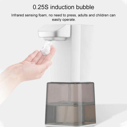 Automatic Foam Soap Dispenser for Home Hand Washing dispensing foam into a hand with infrared sensor, touchless kitchen or bathroom hygiene