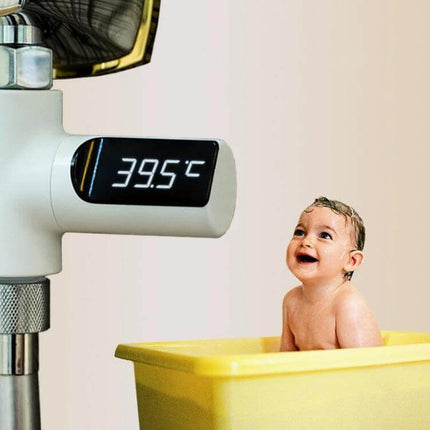Baby Bath Water Thermometer Rotatable 360 Degree For Gentle Bath Time LED display showing 39.5°C above smiling baby in yellow tub